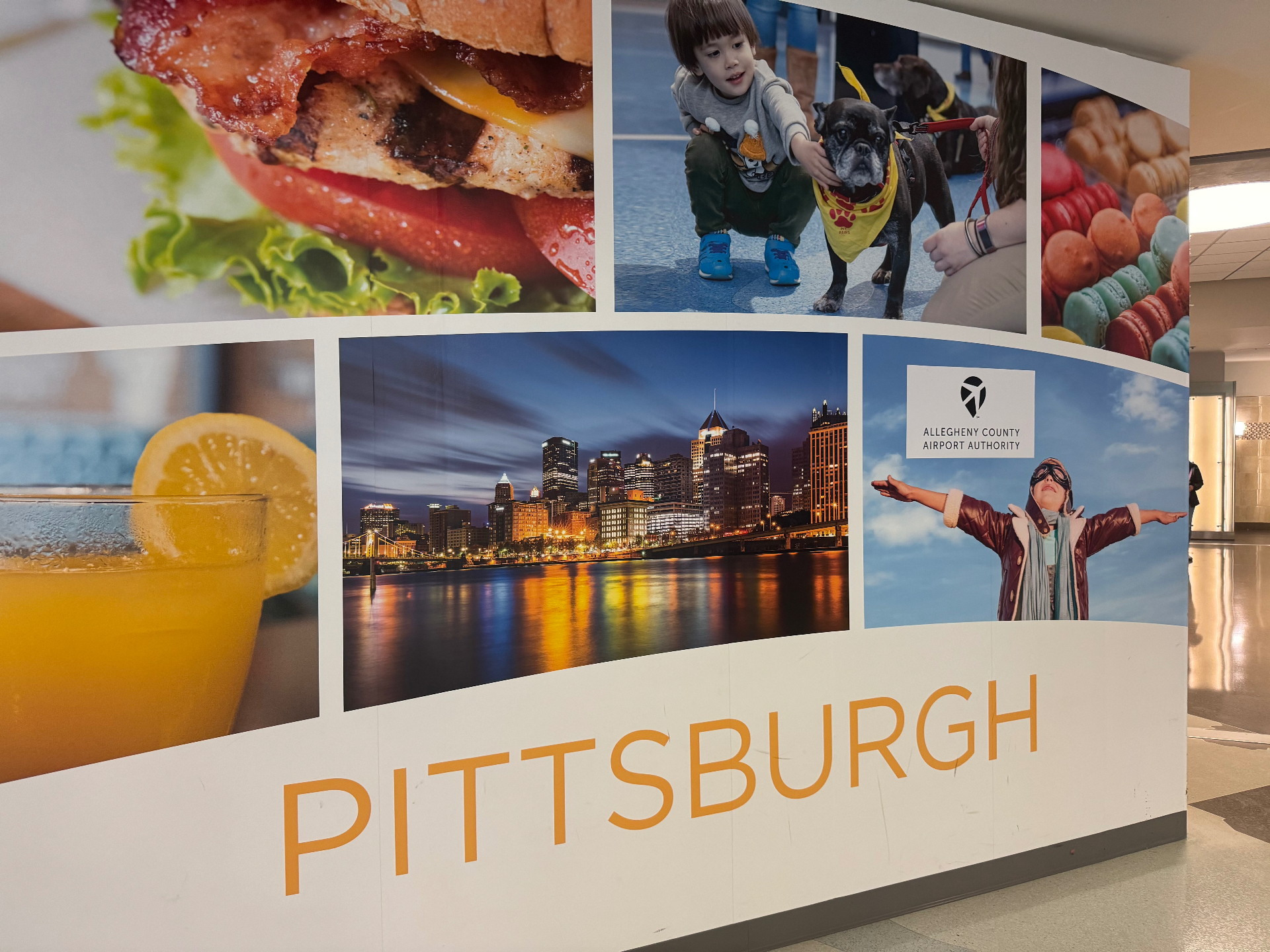 Pittsburgh airport welcome mural on arrival