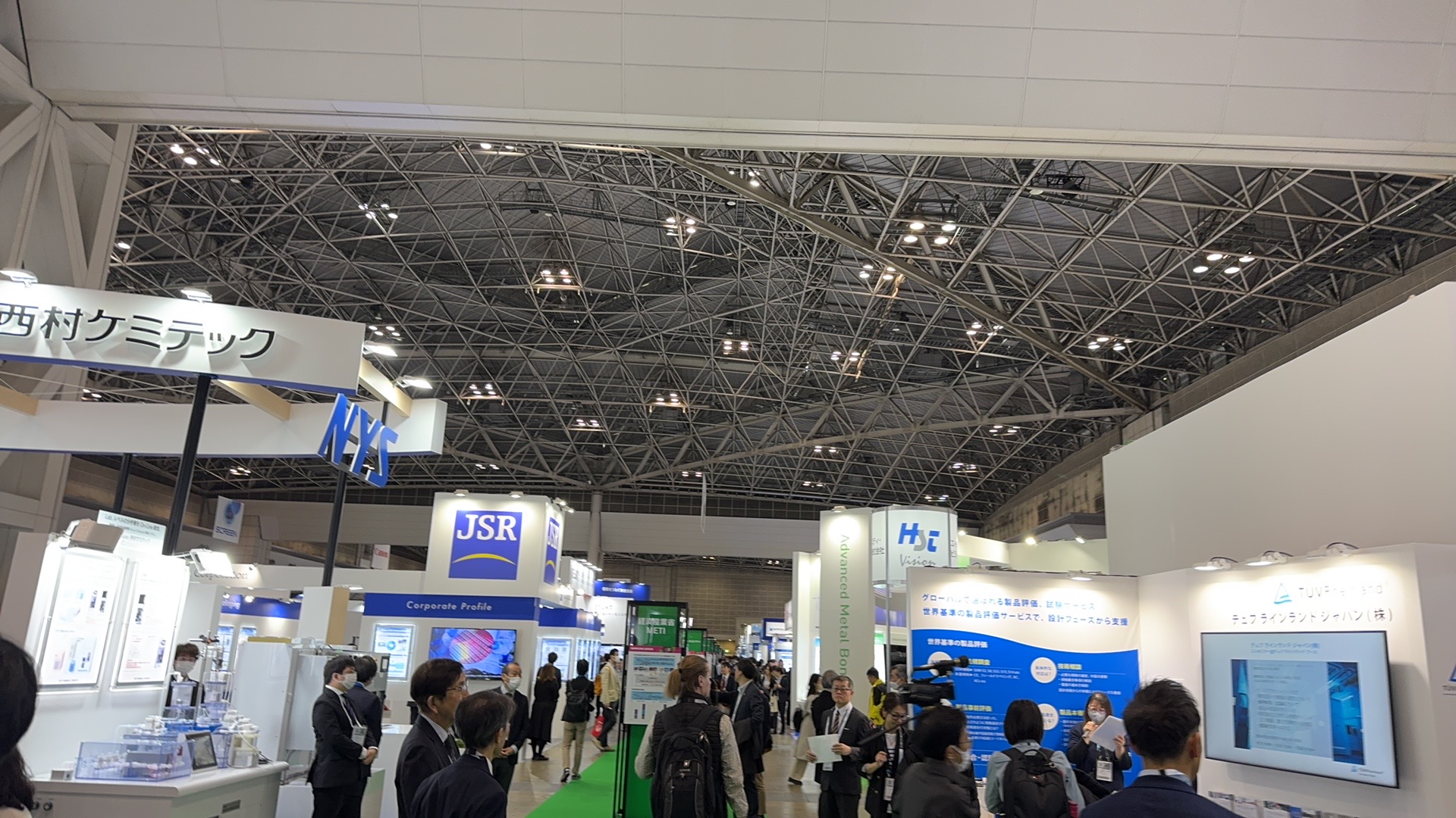 SEMICON Japan 2024 exhibition hall with JSR, Nishimura Chemitech, and HJC Vision booths