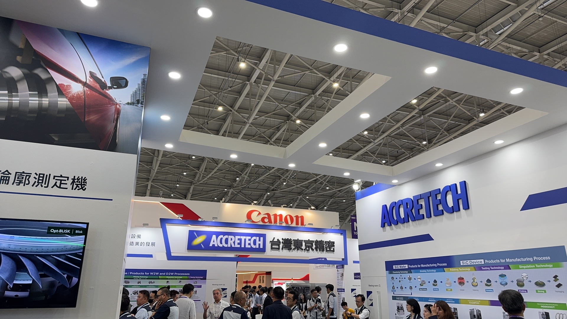 Canon and Accretech booths at SEMICON Taiwan 2025 showcasing precision semiconductor equipment
