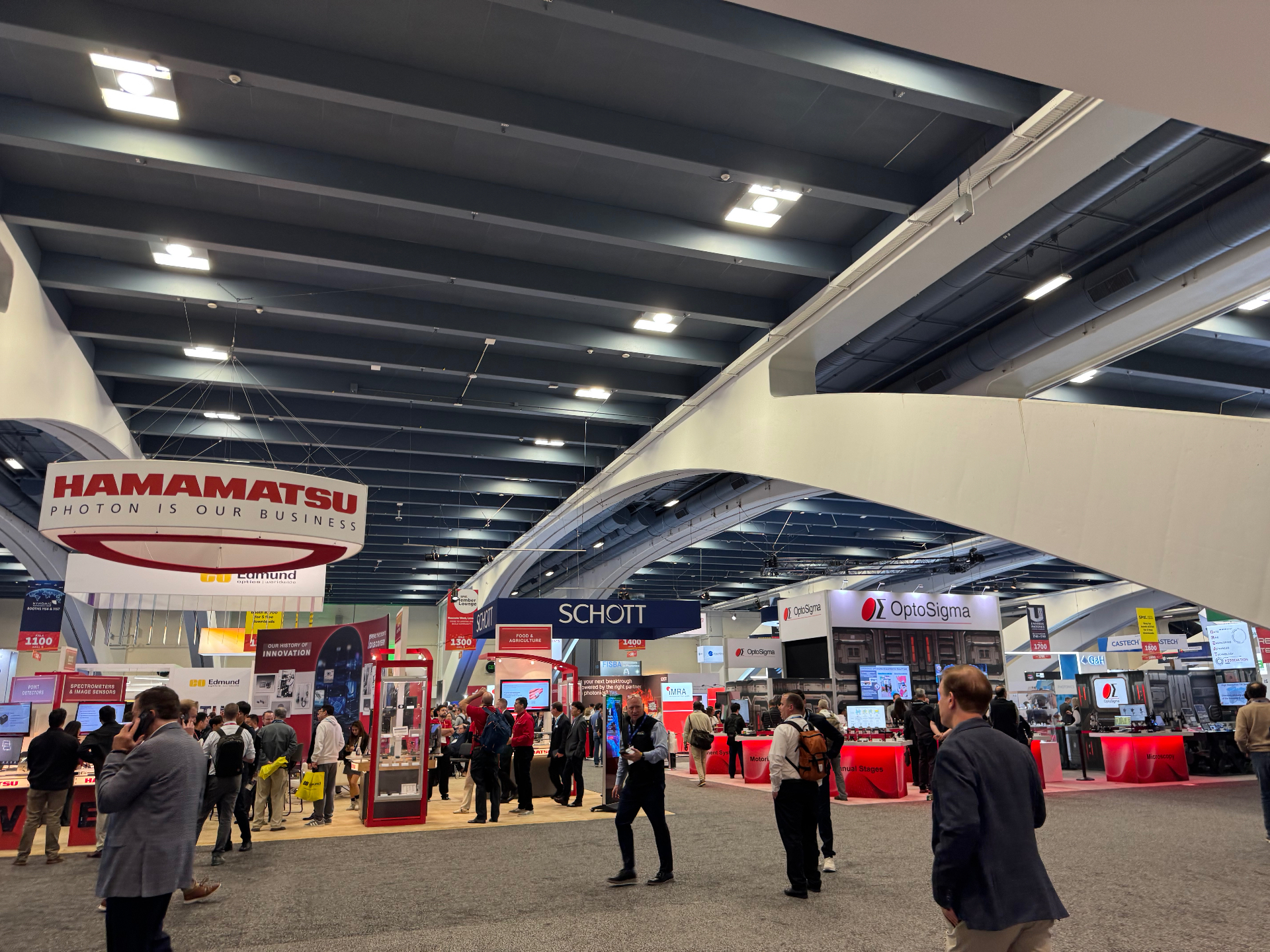 Hamamatsu, SCHOTT, and OptoSigma booths at SPIE Photonics West 2026 show floor